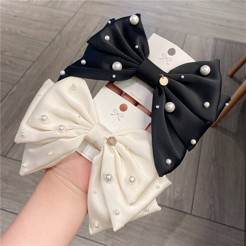 Pearl Embellished Bow Hair Clip